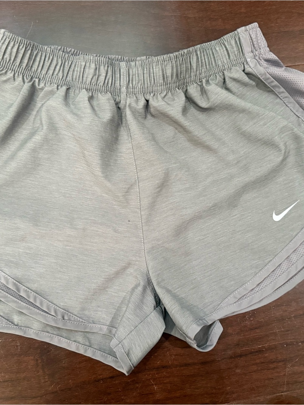 Nike Women’s Light Gray Athletic Running Shorts with White Swoosh
